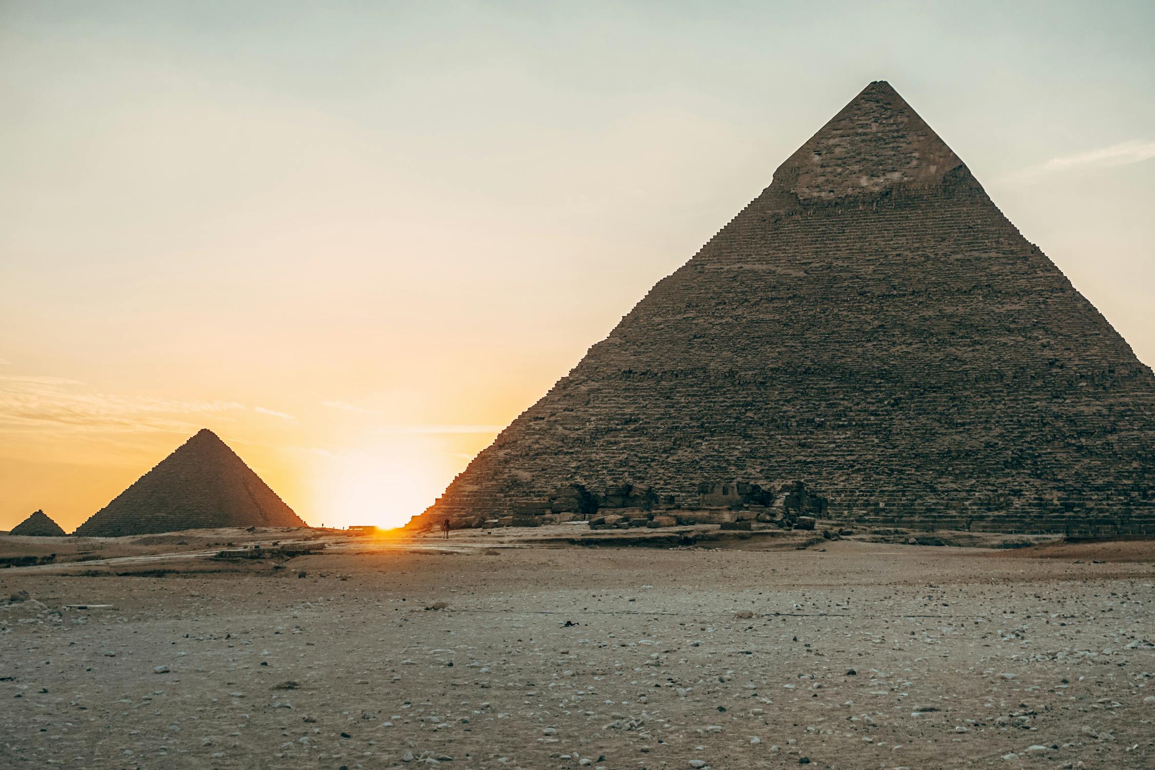 Golden sunrise over the Pyramids of Giza